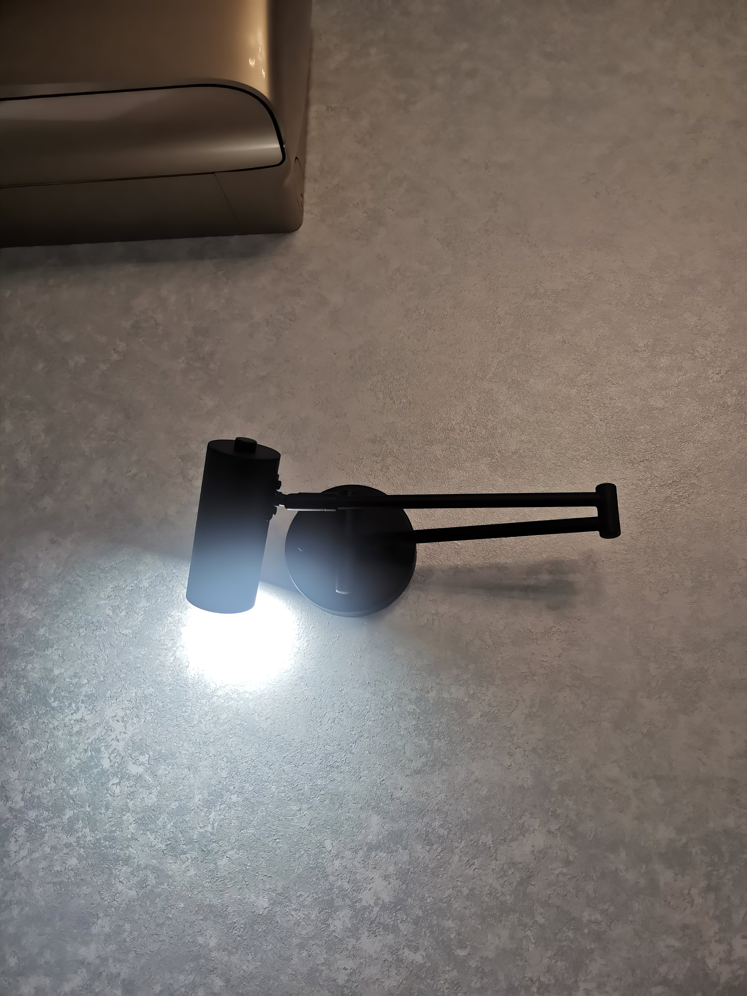 Belal Swing Arm Wall Light